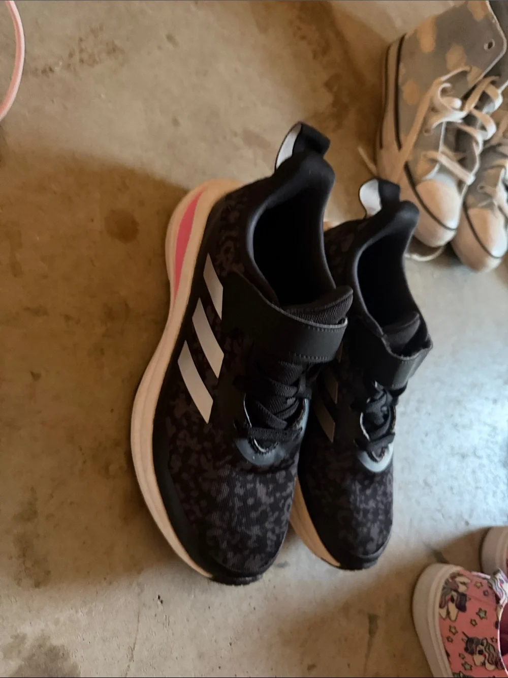 Adidas Girl’s black Sneakers with Pink Accent